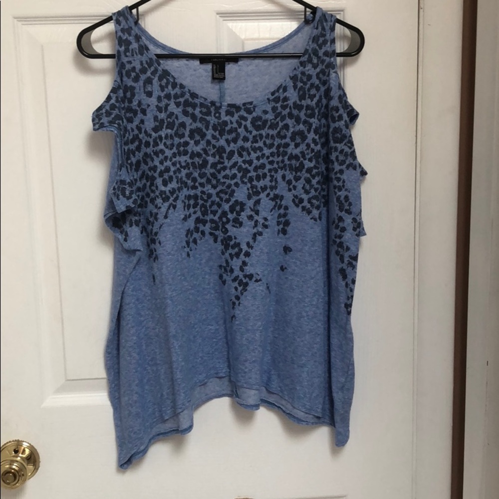 Blue light knit top with shoulder cutouts